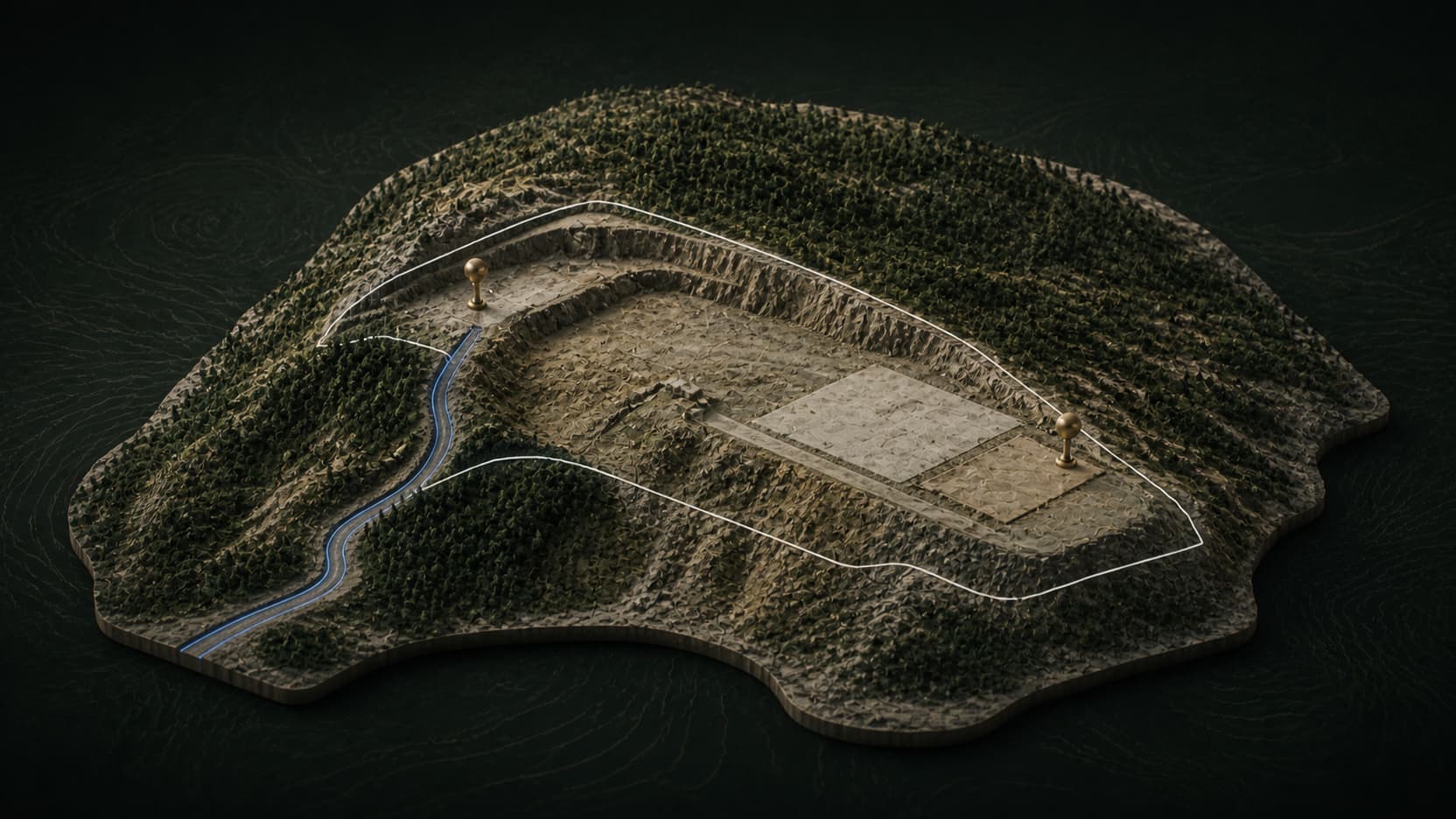 A tactile sloped construction site terrain model with a blue access route, defined boundary, cut slope and two brass markers